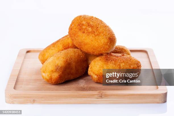 croquetas on white background - spanish food stock pictures, royalty-free photos & images