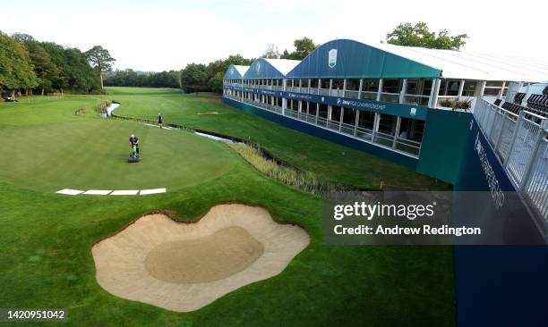 General view of greenkeepers working on the 18th hole during a practice round prior to the BMW PGA Championship at Wentworth Golf Club on September...