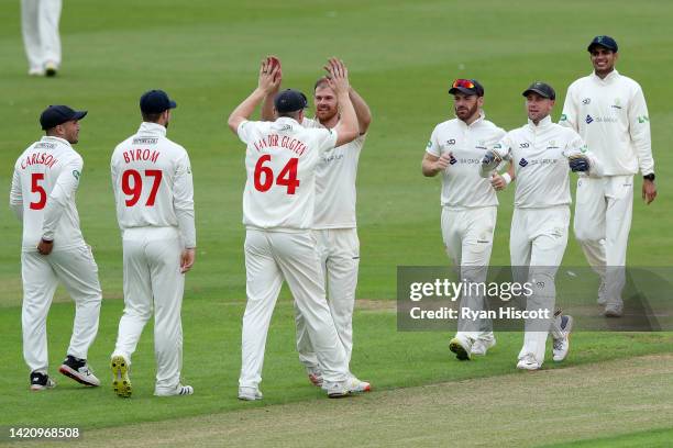 James Harris of Glamorgan celebrates with teammates after Jake Libby of Worcestershire is dismissed by leg-before-wicket during the LV= Insurance...