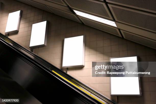 blank billboard posters in the subway station for advertising. - subway station poster stock pictures, royalty-free photos & images