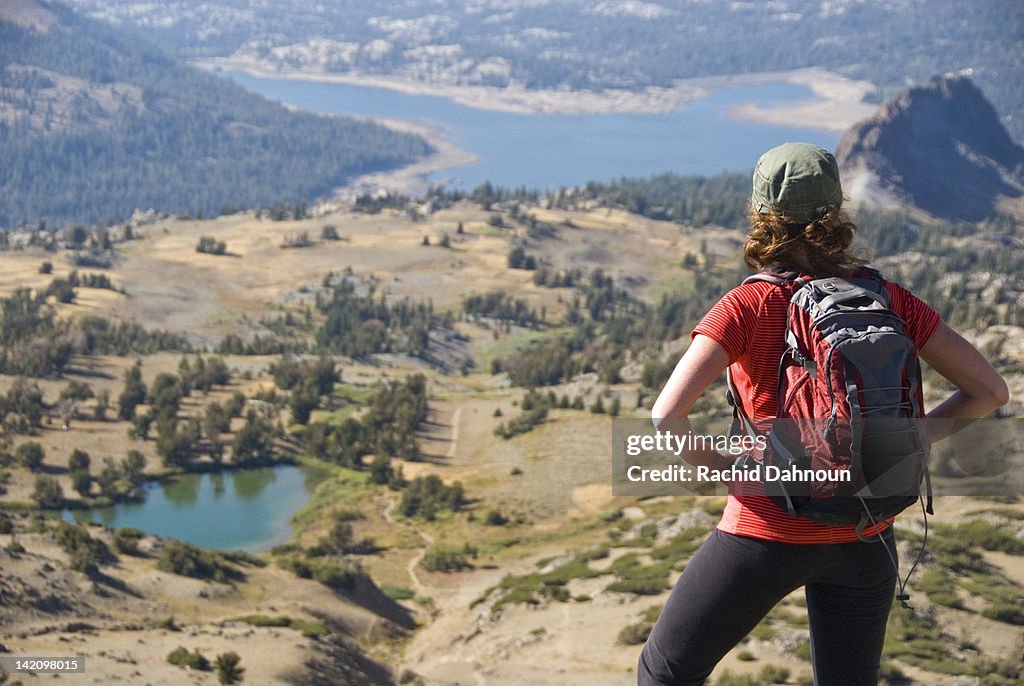 A woman takes in the view on a hike near Carson Pass in the Sierra Nevada, California.