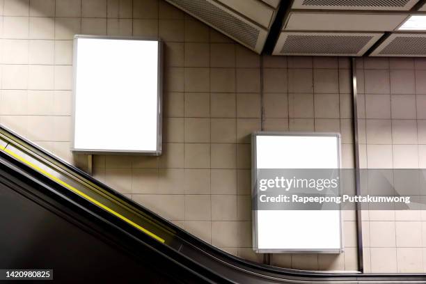 blank billboard in the subway station, banners with room to add your own text - subway station poster stock pictures, royalty-free photos & images