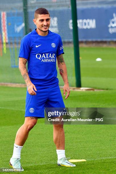 Marco Verratti looks on during a Paris Saint-Germain training session ahead of their UEFA Champions League group H match against Juventus at Camp des...