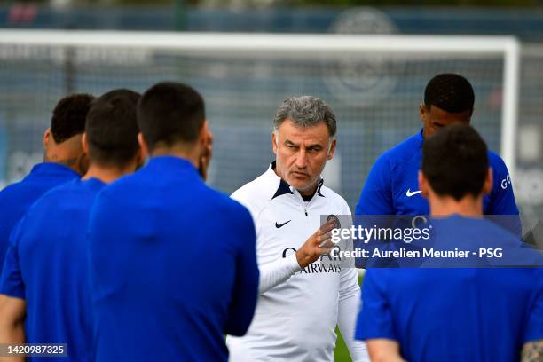 Christophe Galtier addresses his players before a Paris Saint-Germain training session ahead of their UEFA Champions League group H match against...