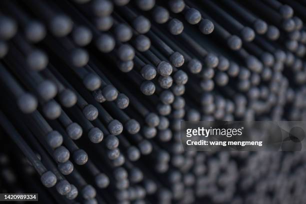 raised abstract black nails - 灰色的背景 stockfoto's en -beelden