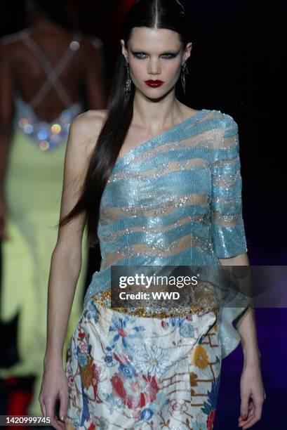 Models 2003 A model walks down the runway at the Spring 2003 Valentino show in ...