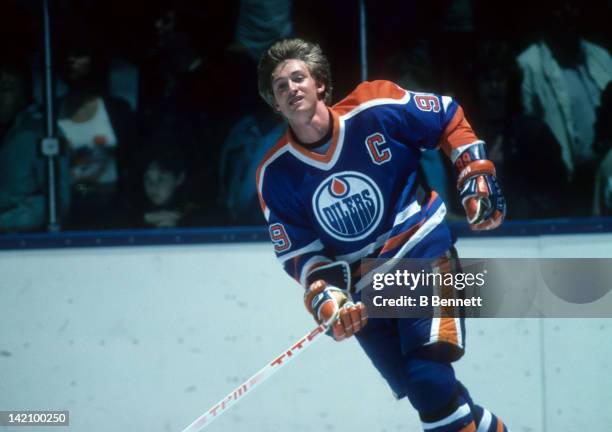 Wayne Gretzky of the Edmonton Oilers skates on the ice during warm ups before the game against the New York Islanders during the 1984 Stanley Cup...