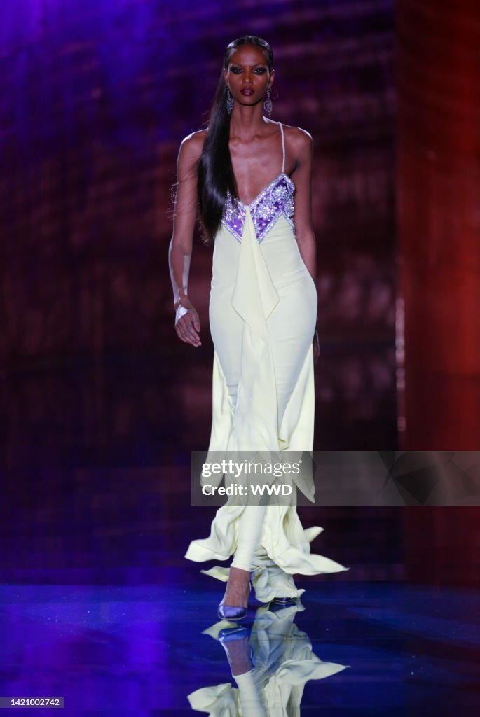 Models 2003 A model walks down the runway at the Spring 2003 Valentino show in ...