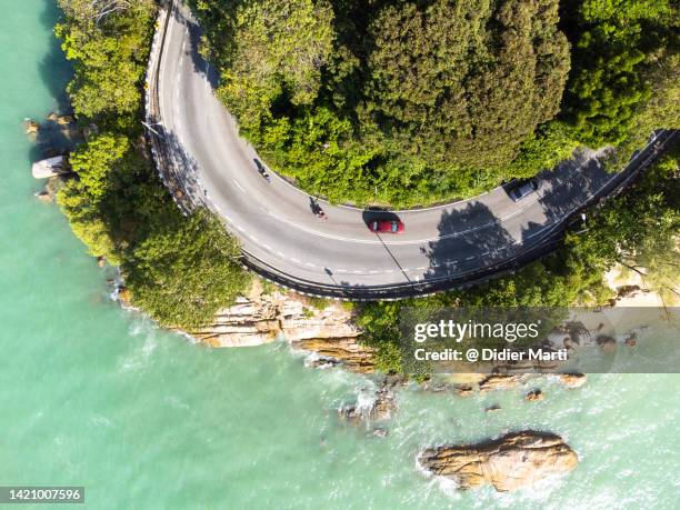 on the road in penang, malaysia - penang state stock pictures, royalty-free photos & images