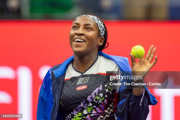 September 04: Coco Gauff of the United States hits balls into the crowd after her victory against Shuai Zhang of China in the Women's Singles fourth...