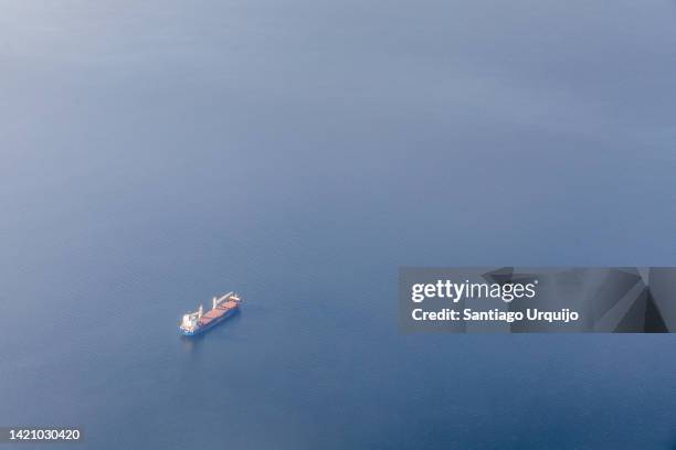 aerial view of container ship in gulf of riga - latvia sea stock pictures, royalty-free photos & images