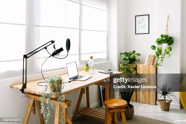 empty content creator workplace home studio with laptop, microphone and modern furniture - table of content stock pictures, royalty-free photos & images