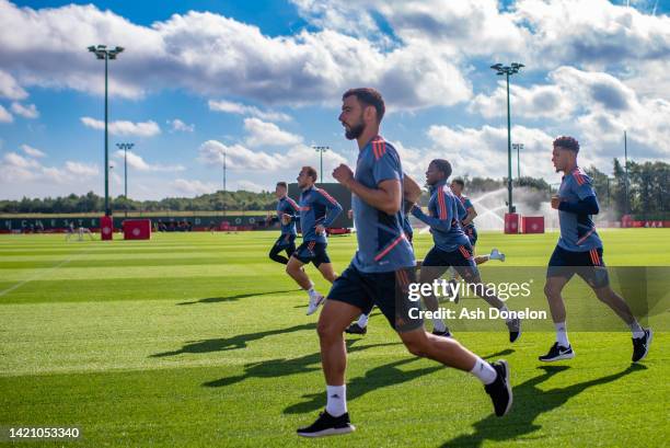 Bruno Fernandes, Tyrell Malacia, Jadon Sancho of Manchester United i action during a first team training session at Carrington Training Ground on...