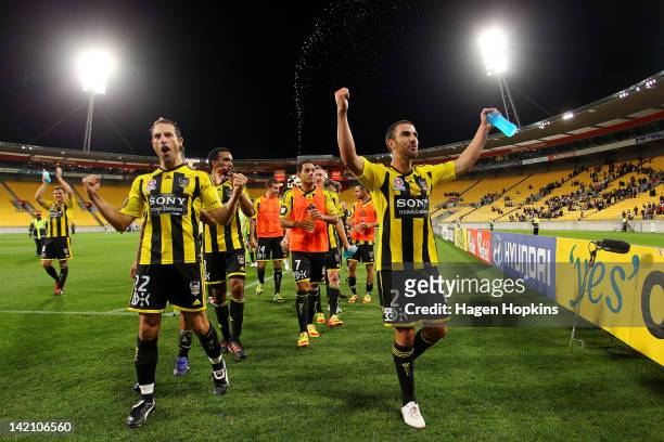 Andrew Durante and Manny Muscat of the Phoenix celebrate their victory during the A-League Elimination Final match between the Wellington Phoenix and...