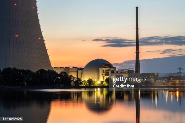 isar nuclear power plant isar 2 at sunset (bavaria, germany) - nuclear energy stock-fotos und bilder