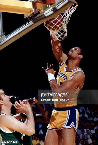 Lakers Kareem Abdul-Jabbar scores over Celtics Larry Bird during 1985 NBA Finals between Los Angeles Lakers and Boston Celtics, June 2, 1985 in...