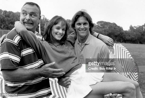 Hosts of the television show 'Star Games' NFL great Dick Butkus and Olympian Bruce Jenner hold actress Pamela Sue Martin, June 15,1985 in Santa...