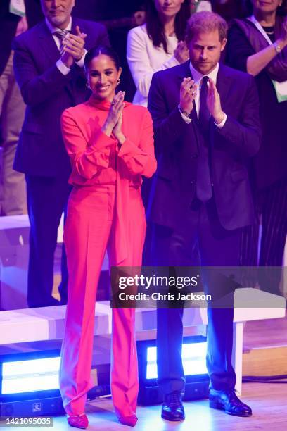 Meghan, Duchess of Sussex and Prince Harry, Duke of Sussex clapping during the Opening Ceremony of the One Young World Summit 2022 at The Bridgewater...