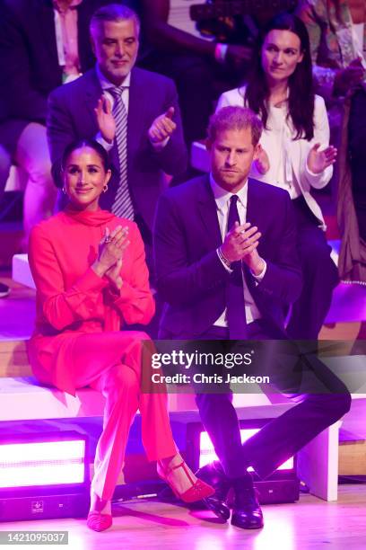 Meghan, Duchess of Sussex and Prince Harry, Duke of Sussex clapping during the Opening Ceremony of the One Young World Summit 2022 at The Bridgewater...