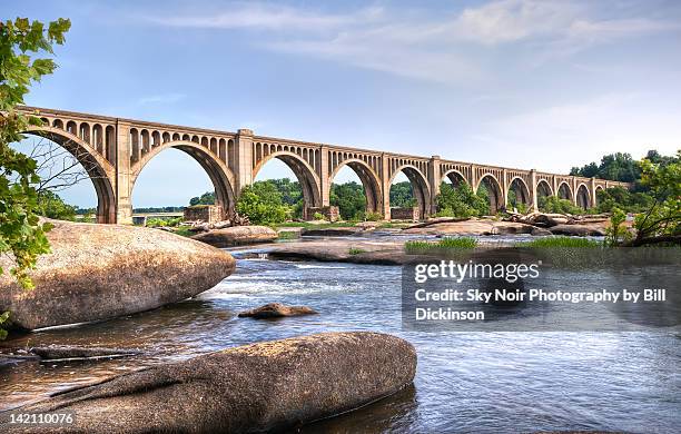 james river railway bridge - railway bridge stock-fotos und bilder