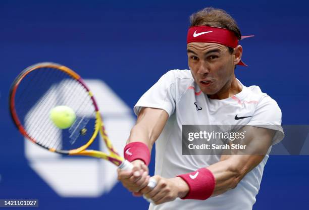 Rafael Nadal of Spain returns a shot against Frances Tiafoe of the United States during their Men’s Singles Fourth Round match on Day Eight of the...