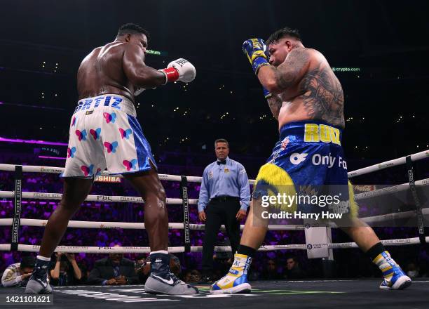 Andy Ruiz fights Jr. Luis Ortiz to a unanimous decision win as referee Thomas Taylor watches during a WBC world heavyweight title eliminator fight on...