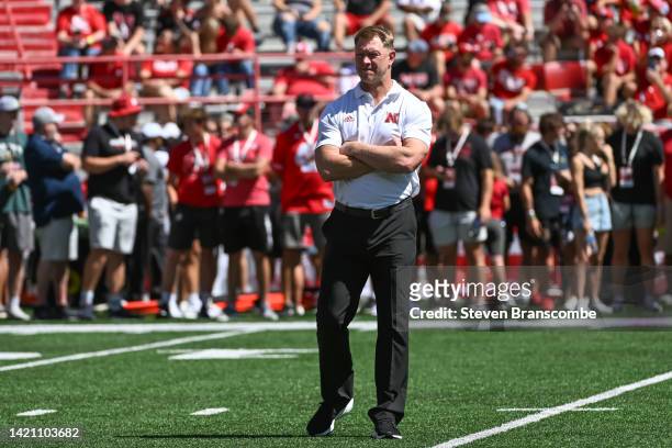 Head coach Scott Frost of the Nebraska Cornhuskers watches the team warm up before the game against the North Dakota Fighting Hawks at Memorial...