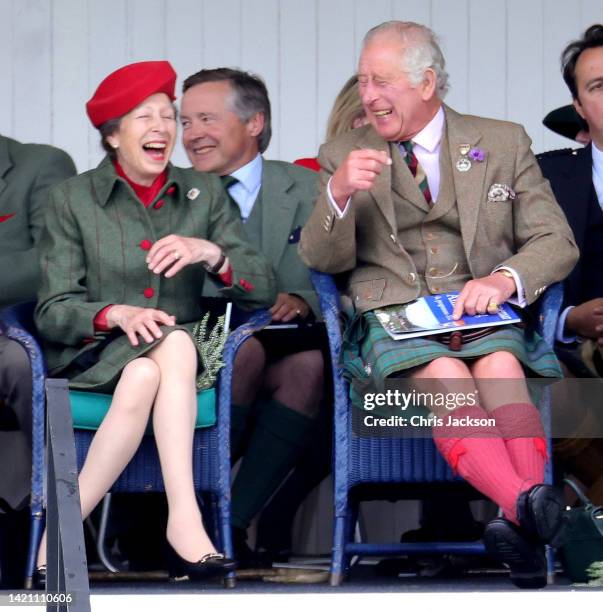 Anne, Princess Royal and Prince Charles, Prince of Wales, known as the Duke of Rothesay when in Scotland laughing during the Braemar Highland...