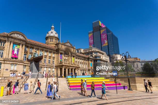 birmingham united kingdom museum and art gallery with brightly coloured steps leading to it. many people are visible on the streets - birmingham uk stock pictures, royalty-free photos & images