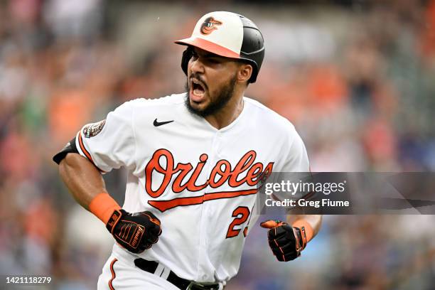 Anthony Santander of the Baltimore Orioles celebrates after hitting a home run in the first inning against the Toronto Blue Jays at Oriole Park at...