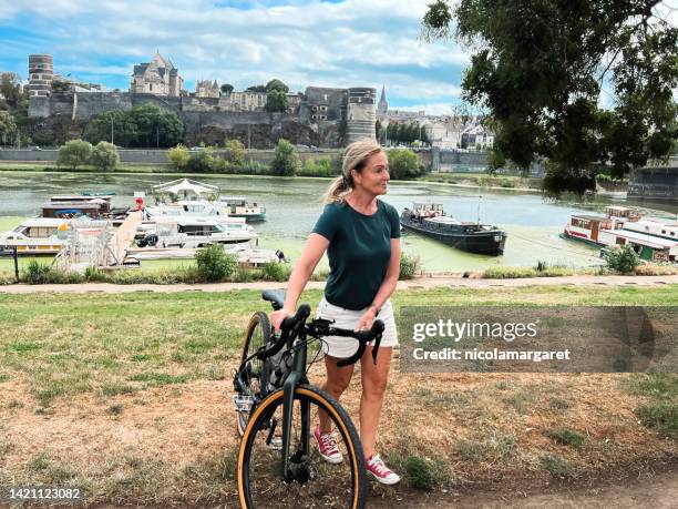 cycling in france. angers chateau - cycling loire valley stock pictures, royalty-free photos & images