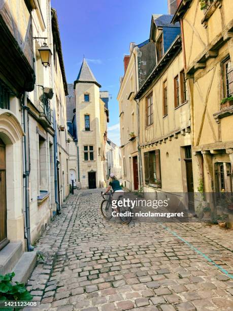 cycling in france. angers chateau - cycling loire valley stock pictures, royalty-free photos & images