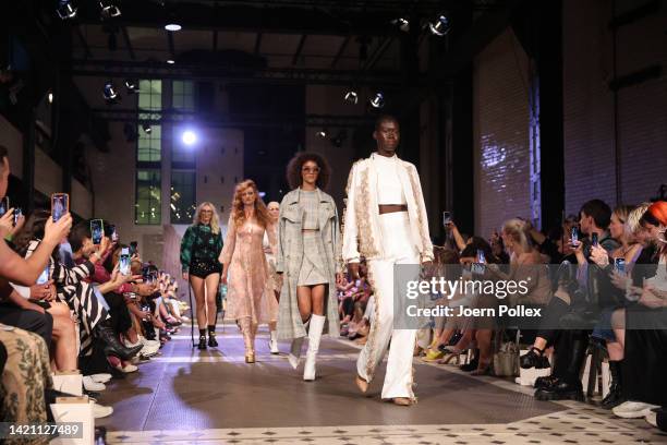 Models walk the runway at the Marcel Ostertag Fashion Show during the Berlin Fashion Week September 2022 at e-Werk on September 05, 2022 in Berlin,...