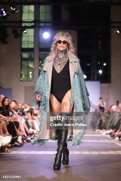 Model walks the runway at the Marcel Ostertag Fashion Show during the Berlin Fashion Week September 2022 at e-Werk on September 05, 2022 in Berlin,...