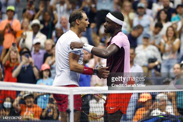Frances Tiafoe of the United States shakes hands after defeating Rafael Nadal of Spain during their Men’s Singles Fourth Round match on Day Eight of...