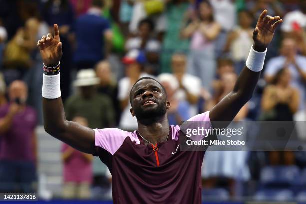 Frances Tiafoe of the United States celebrates after defeating Rafael Nadal of Spain during their Men’s Singles Fourth Round match on Day Eight of...