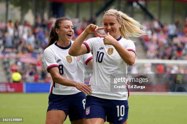 Lindsey Horan of United States celebrates a goal with Sofia Huerta of United States against Nigeria during an international friendly at Children's...