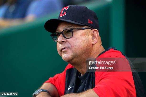 Manager Terry Francona of the Cleveland Guardians watches from the dugout prior to a game against the Kansas City Royals at Kauffman Stadium on...