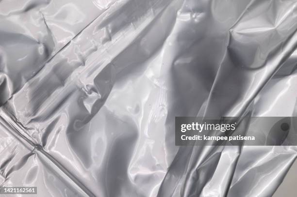 aluminum foil bag - chips bag stockfoto's en -beelden