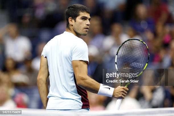 Carlos Alcaraz of Spain looks on against Marin Cilic Of Croatia during their Men’s Singles Fourth Round match on Day Eight of the 2022 US Open at...