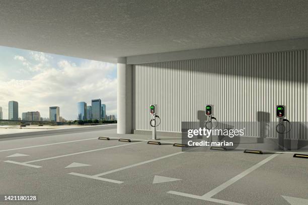 3d rendering,parking space with electric vehicle charging equipment - parking space imagens e fotografias de stock