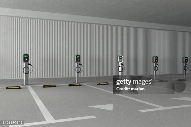 3d rendering,indoor charging pile parking space - parkplatz leer stock-fotos und bilder