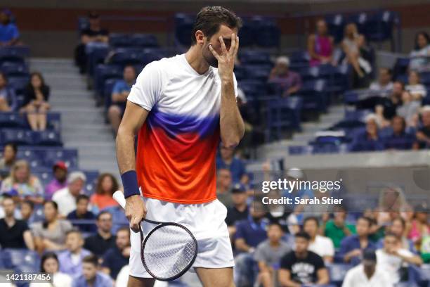 Marin Cilic of Croatia reacts against Carlos Alcaraz of Spain during their Men’s Singles Fourth Round match on Day Eight of the 2022 US Open at USTA...