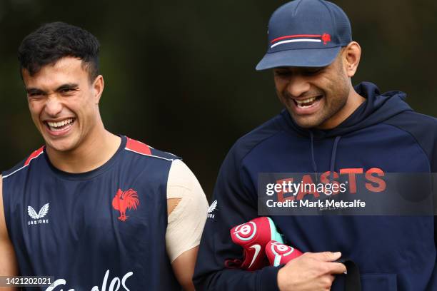 Daniel Tupou and Joseph Suaalii of the Roosters laugh as they arrive during a Sydney Roosters NRL training session at Kippax Lake on September 06,...