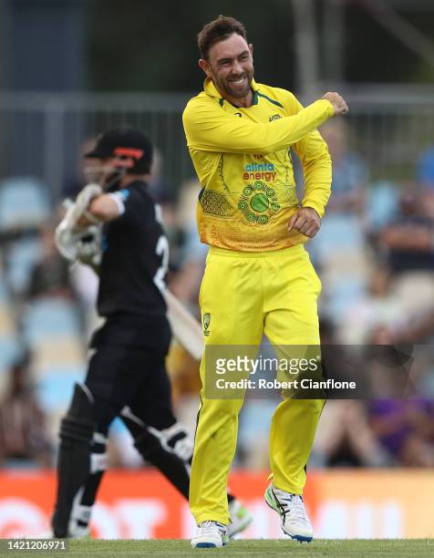 Glenn Maxwell of Australia celebrates taking the wicket of Kane Williamson of New Zealand during game one of the One Day International Series between...
