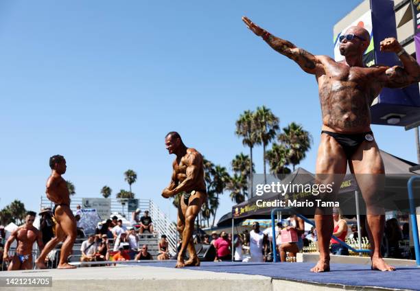 Competitors take part in the Labor Day Muscle Beach Championship in Venice Beach on September 5, 2022 in Los Angeles, California. The National...