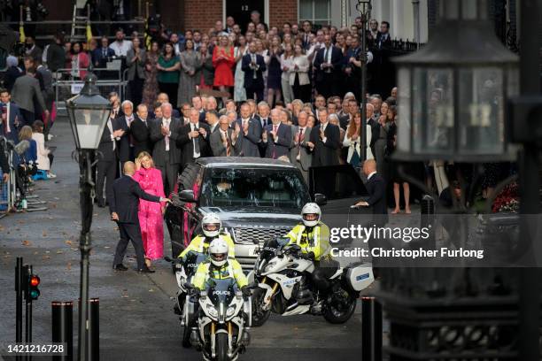 British Caretaker Prime Minister Boris Johnson and wife Carrie depart after his farewell address before his official resignation at Downing Street on...