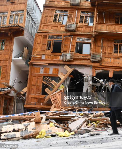 Houses are damaged after a 6.8-magnitude earthquake on September 6, 2022 in Moxi Town of Luding County, Garze Tibetan Autonomous Prefecture, Sichuan...