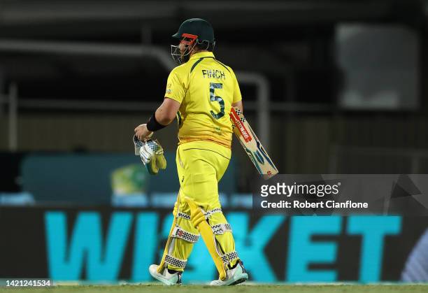 Aaron Finch of Australia walks off after he was dismissed during game one of the One Day International Series between Australia and New Zealand at...