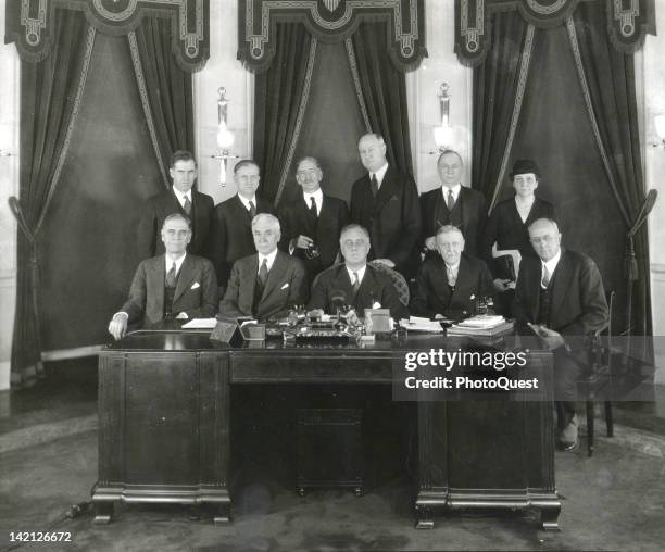 Portrait of American President Franklin D. Roosevelt and his cabinet, 1933. Pictured are, seated from left, Secretary of War George H. Dern ,...